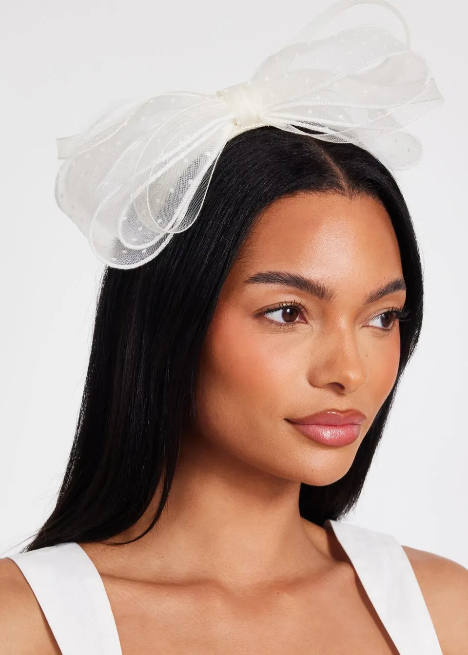 Quiz Cream Polka Dot Bow Fascinator