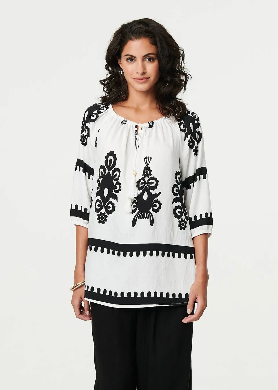 Izabel London White Ikat Print Tassel Tie Neck Blouse
