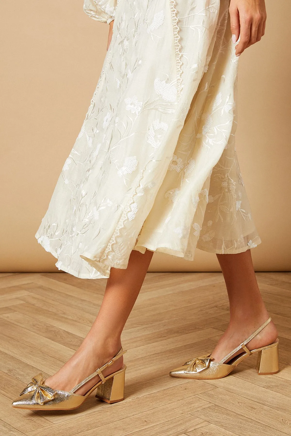 Dorinda Faux Metallic Leather Bow Slingback Block Heeled Shoes