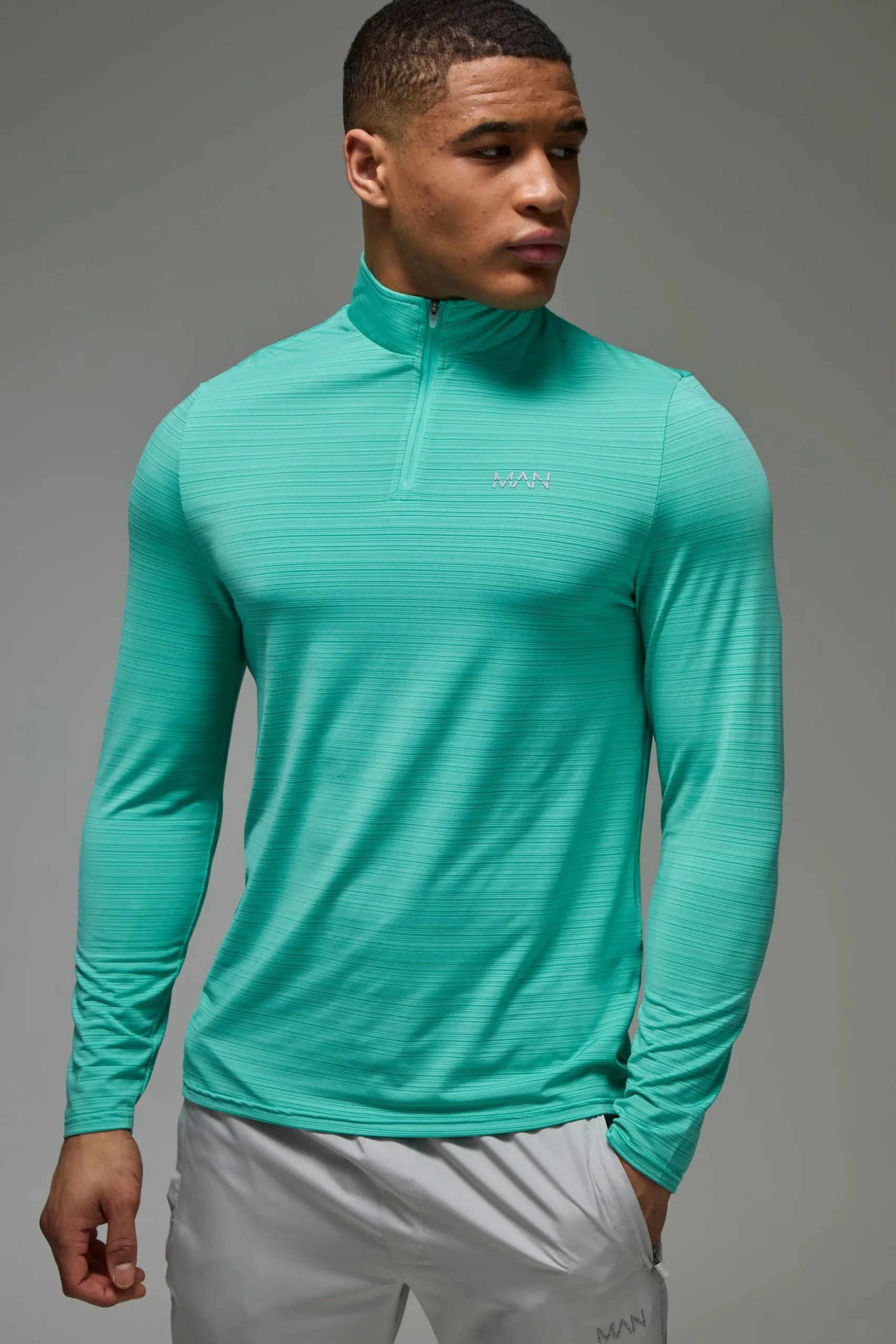 Man Active Regular Fit Engineered Performance 1/4 Zip