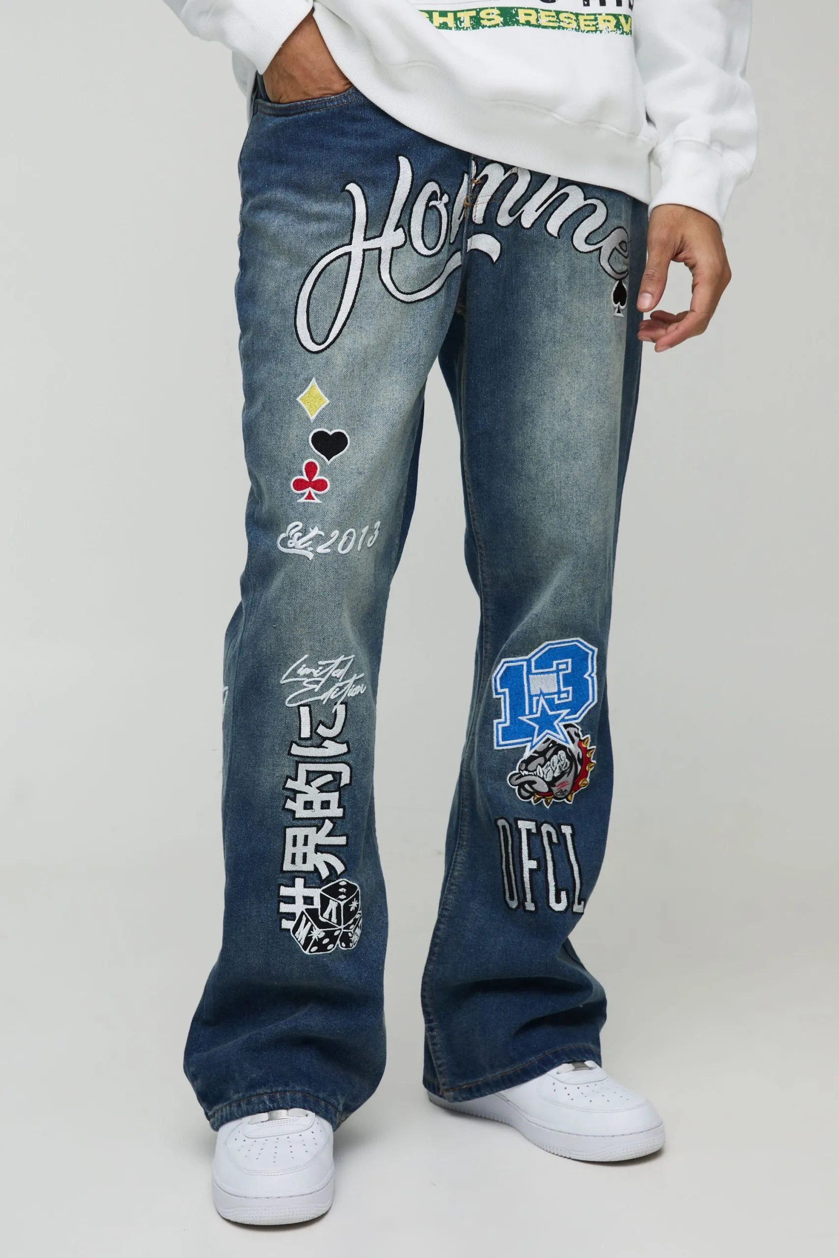 Relaxed Rigid Flared Gusset Varsity Applique Badge Jeans