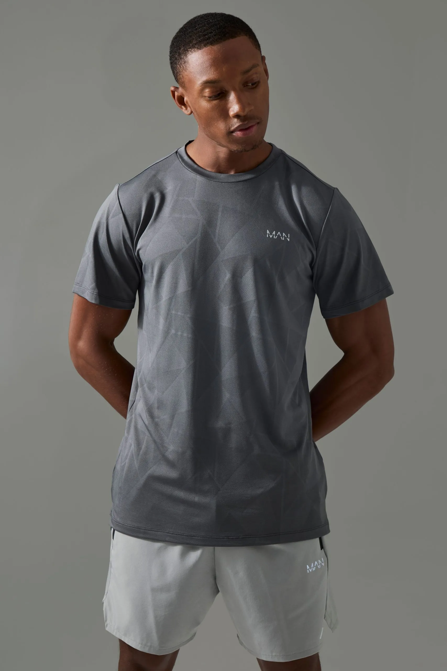 Man Active Geo Jacquard Regular Fit T-shirt