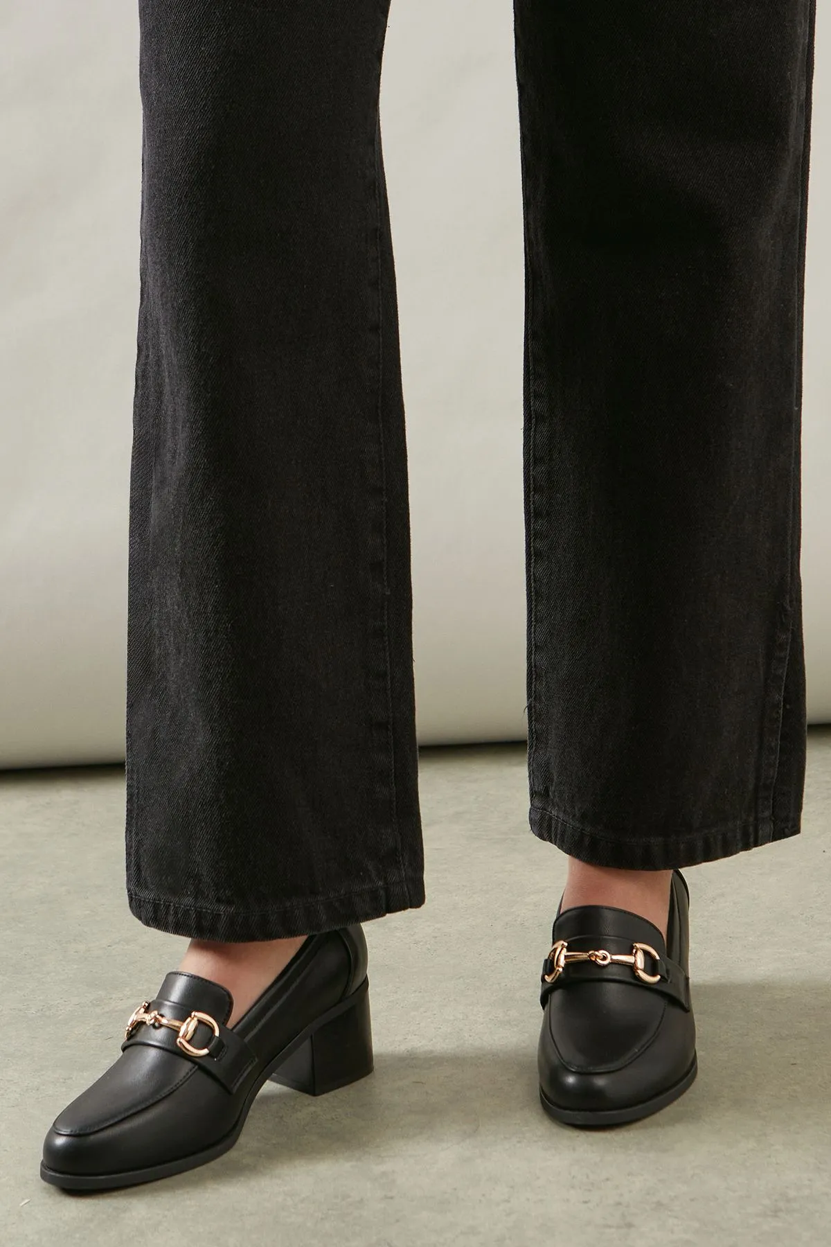 Wide Fit Lydia Faux Leather Snaffle Trim Apron Front Medium Heeled Loafers