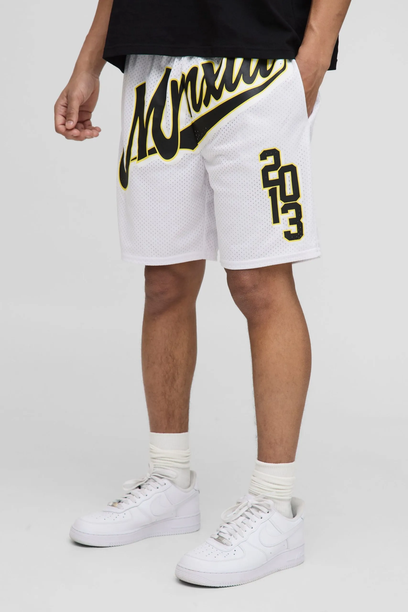Varsity Graphic Mid Length Mesh Basketball Shorts