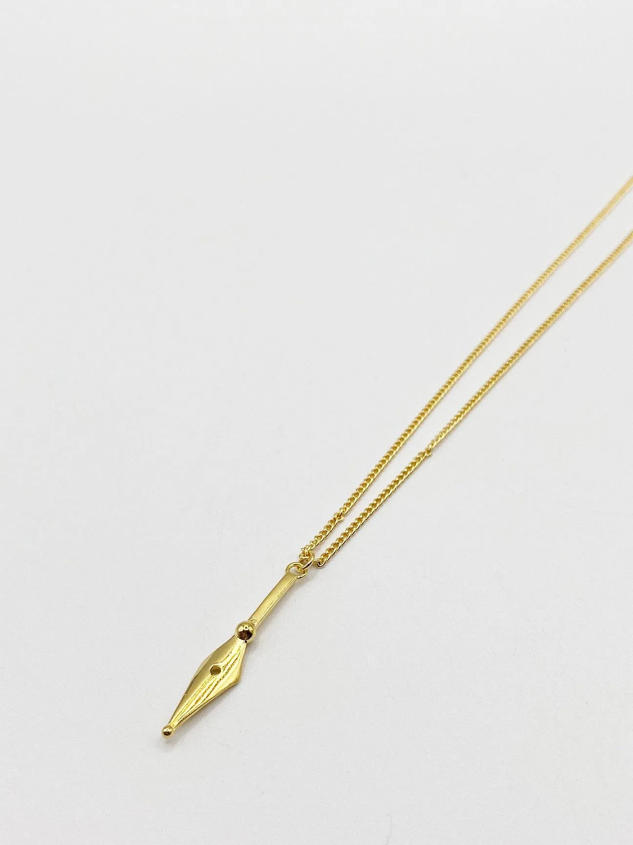 GOLD DROP DOWN ARROW NECKLACE