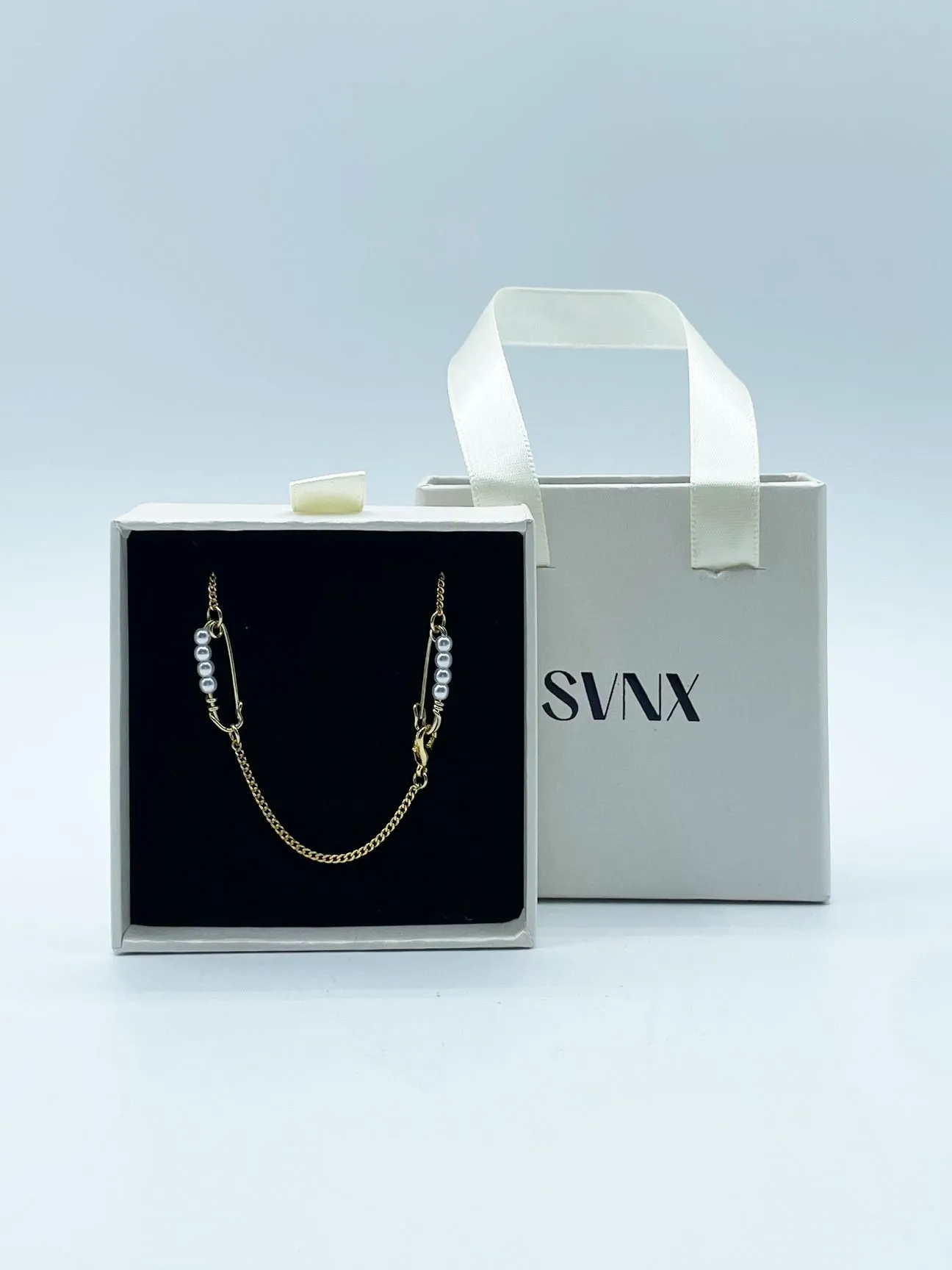 Long Pearl Safety Pin Necklace in Gold