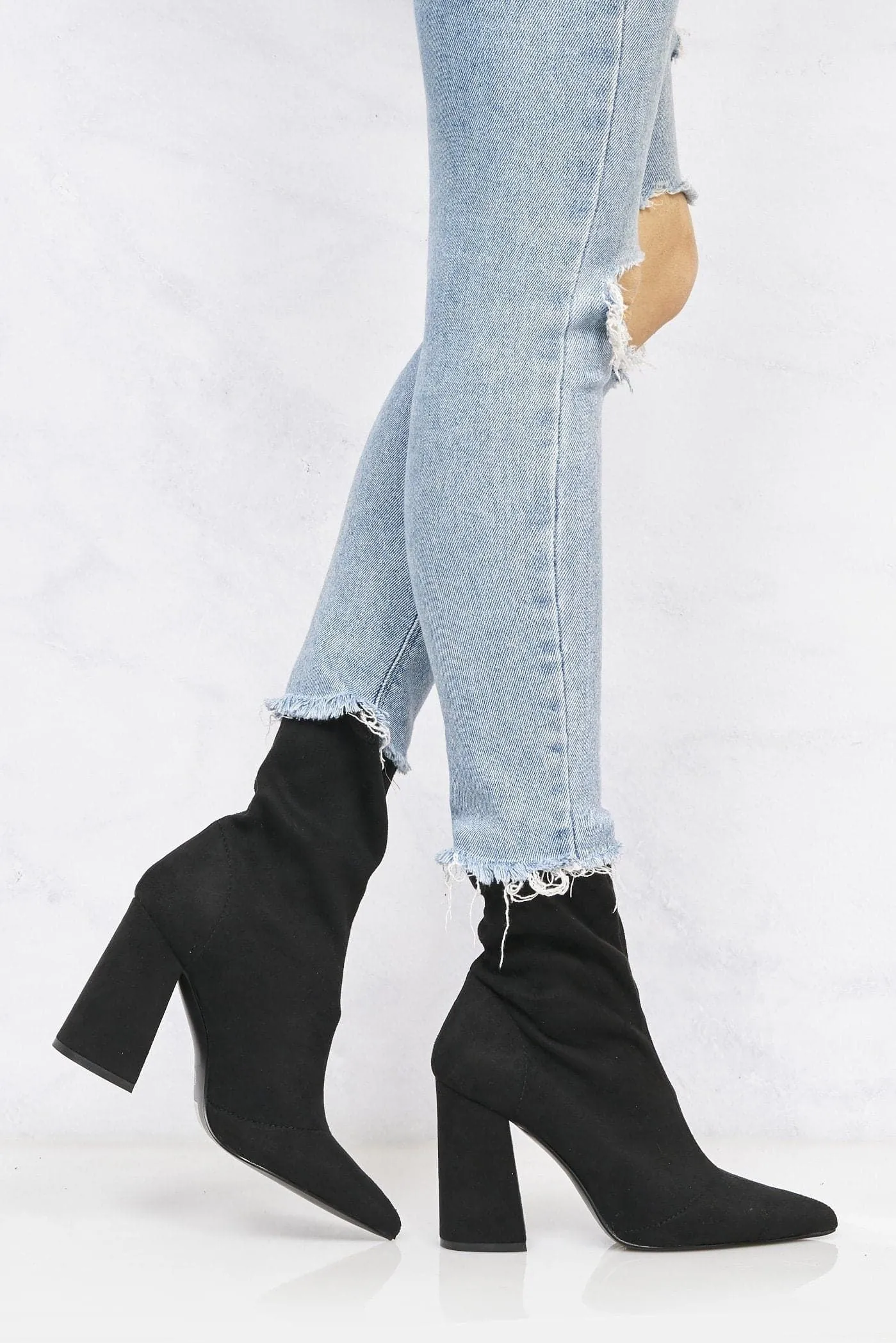 Everly Pointed Toe Flare Heel Faux Suede Calf Boots